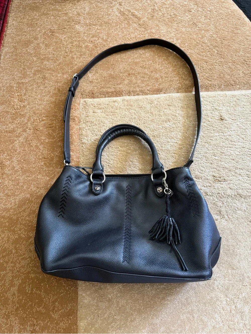 The Sak Black Leather Tote Bag with Tassel Accent